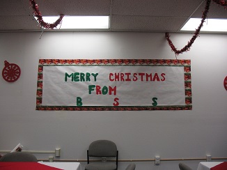 A sign saying Merry Christmas from BSS